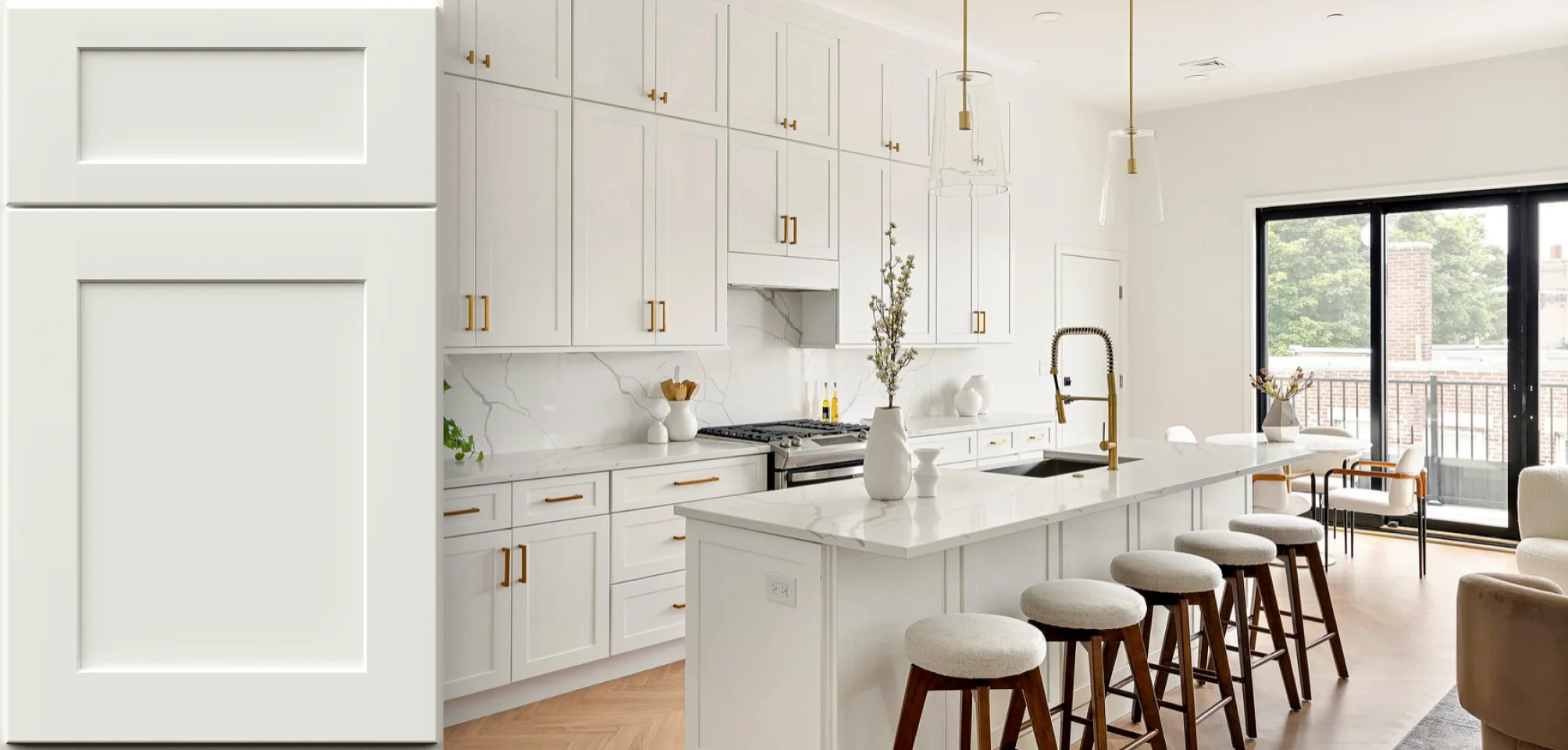 Warm white shaker kitchen with gold hardware and warm pendant lighting
